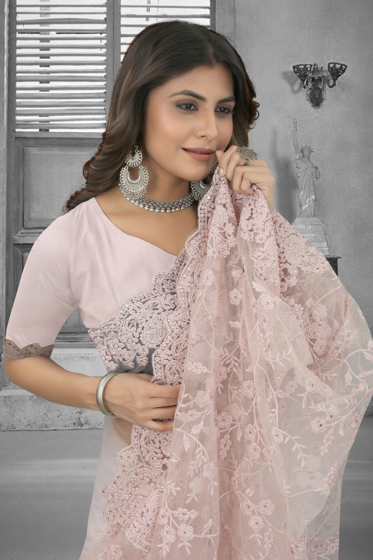 Dusty Peach Colour Net Saree VSSD1090842