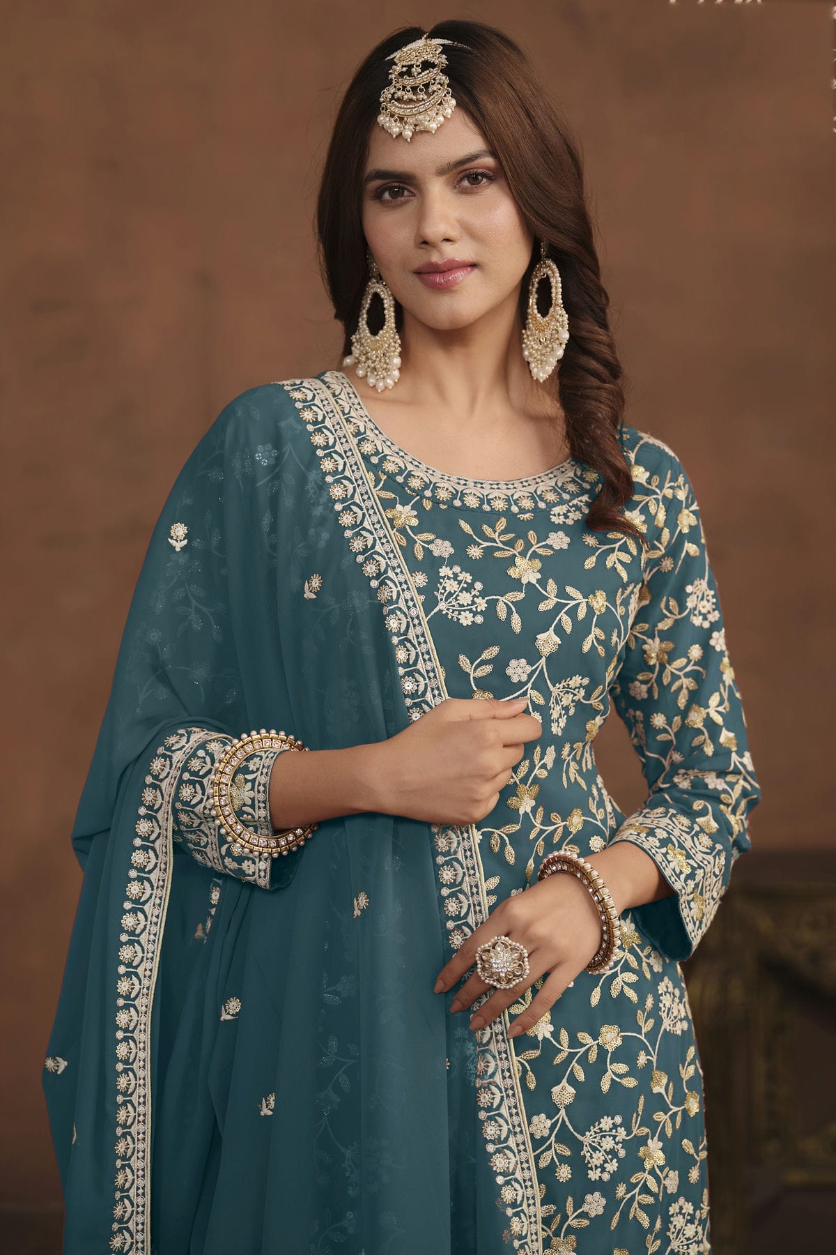 Teal Colour Semi Stitched Faux Georgette Sharara Suit VSSM1050467