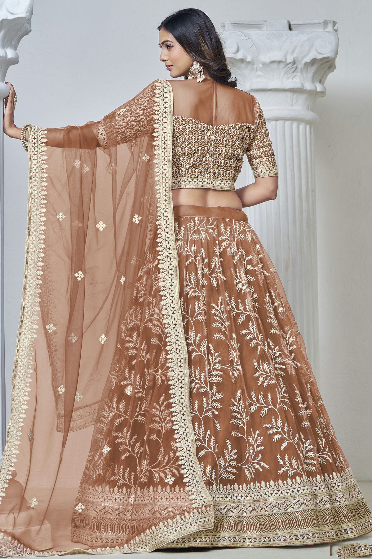 Dusty Peach Colour Embroidery Lehenga Choli In Net Fabric