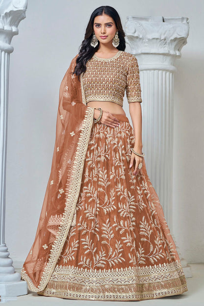 Dusty Peach Colour Embroidery Lehenga Choli In Net Fabric