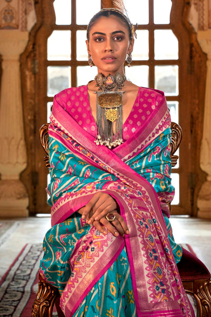 Sky Blue Colour Silk Patola Print Saree VSSD1290053