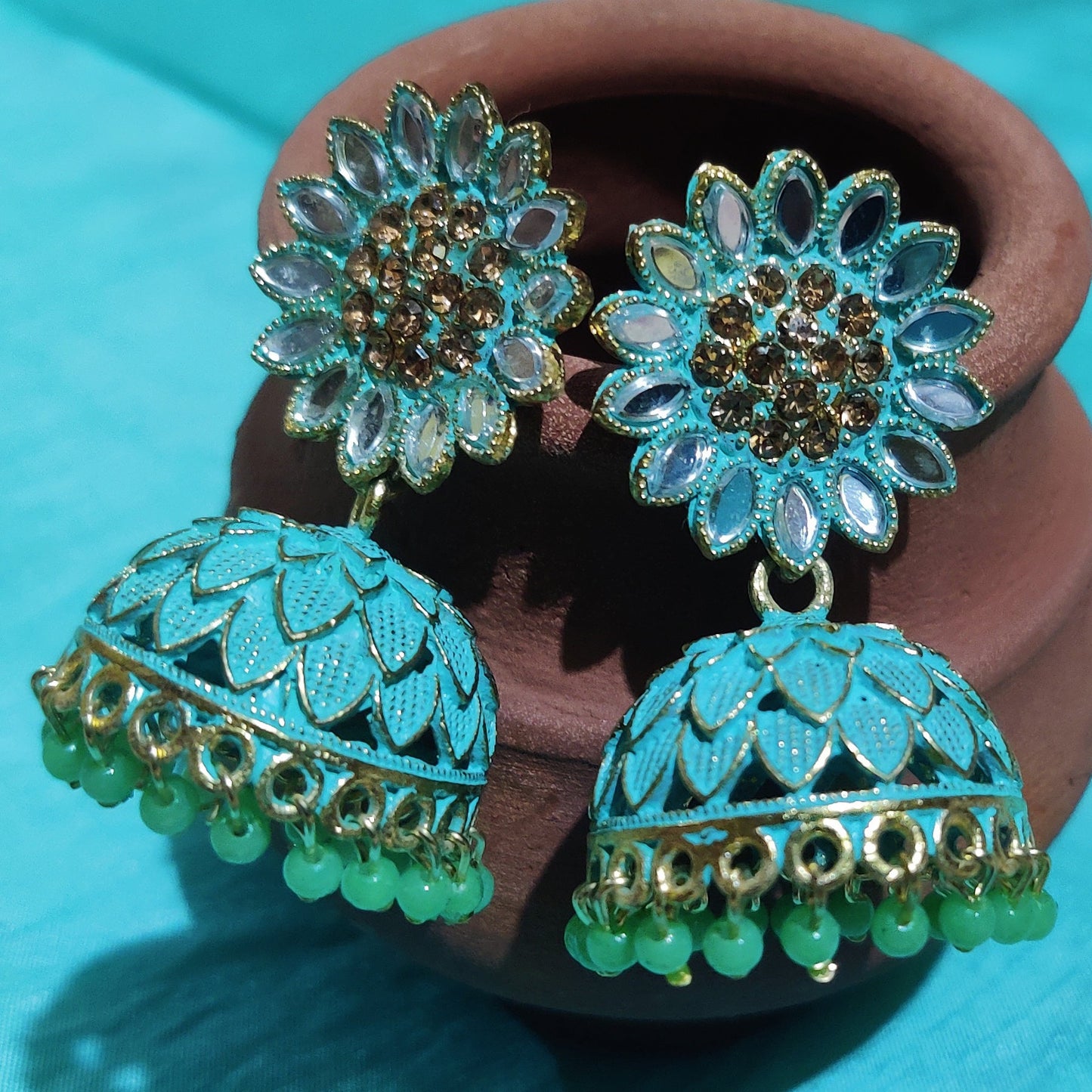 Vastradi Alloy Golden Traditional Jhumka in Sky Blue Colour VSER1200041